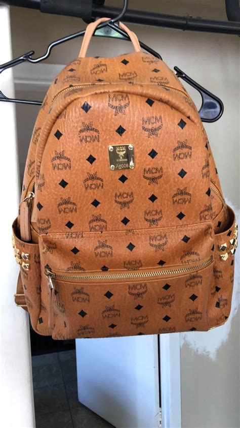 spot a fake mcm bag|authentic mcm bag.